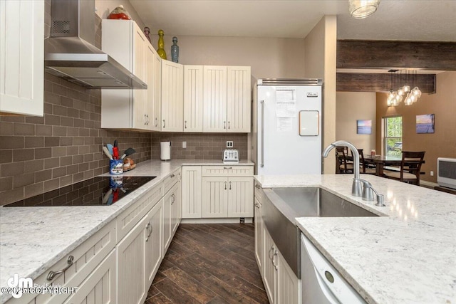 13598 N Willow Dr, Willow, AK 99688 - kitchen featuring wall chimney exhaust hood, white appliances, tasteful backsplash, dark wood-style floors, and beam ceiling