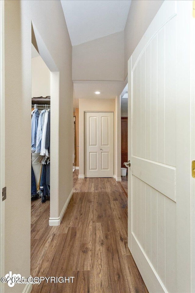 13598 N Willow Dr, Willow, AK 99688 - hall featuring lofted ceiling, baseboards, and wood finished floors