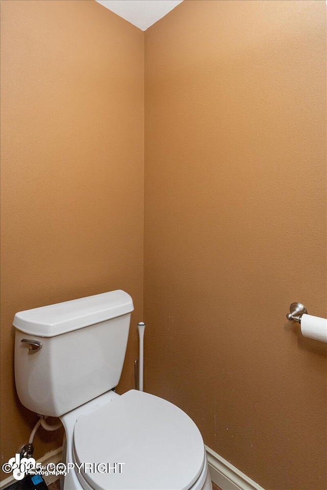 13598 N Willow Dr, Willow, AK 99688 - bathroom featuring toilet and baseboards