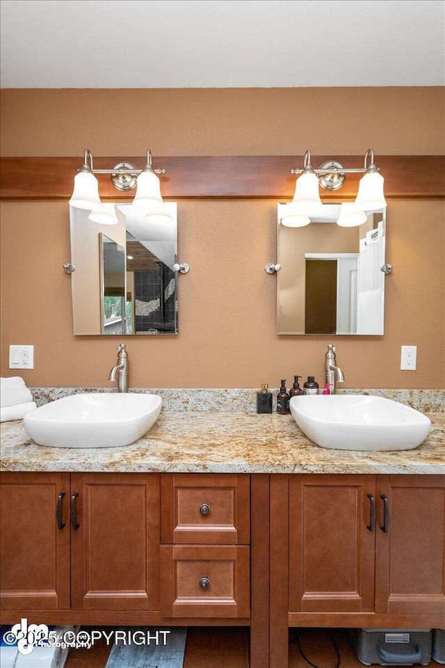 13598 N Willow Dr, Willow, AK 99688 - bathroom with double vanity and a sink