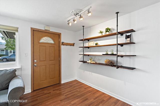 1602 Richardson Dr, Anchorage, AK 99504 - entrance foyer featuring dark wood finished floors and baseboards