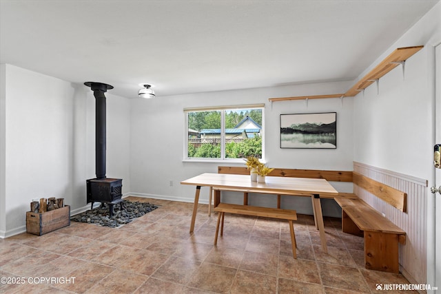 1602 Richardson Dr, Anchorage, AK 99504 - dining space featuring a wood stove and breakfast area