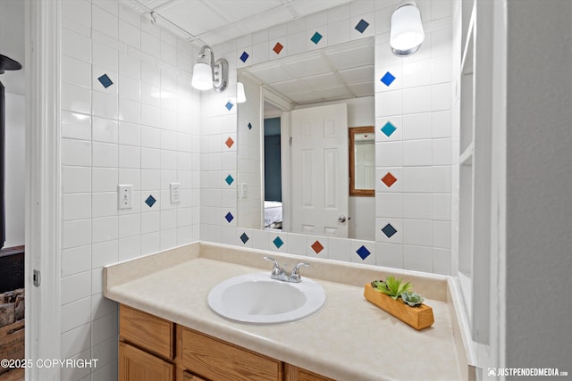 1602 Richardson Dr, Anchorage, AK 99504 - bathroom featuring tile walls and vanity