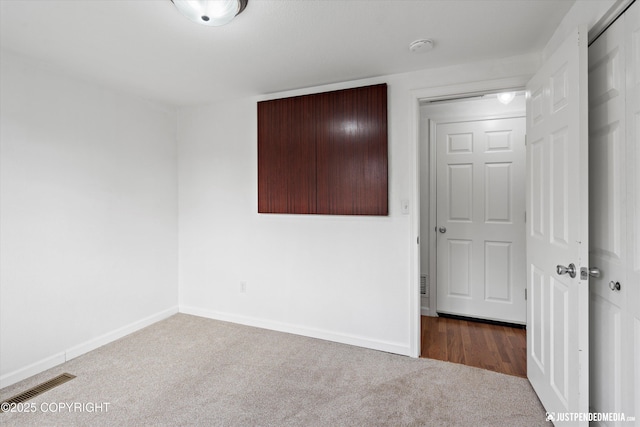 1602 Richardson Dr, Anchorage, AK 99504 - unfurnished bedroom with carpet flooring and a closet