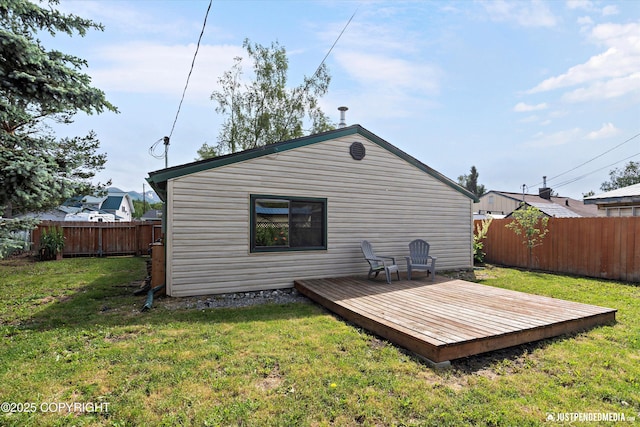 1602 Richardson Dr, Anchorage, AK 99504 - rear view of house featuring a wooden deck and a fenced backyard