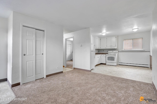 525 E 14th Ave, Anchorage, AK 99501 - kitchen with white cabinets, white appliances, baseboard heating, and light colored carpet