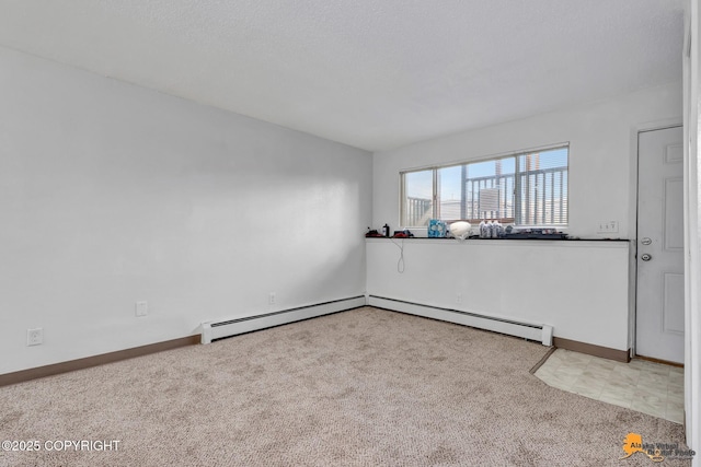 525 E 14th Ave, Anchorage, AK 99501 - empty room with carpet flooring and baseboard heating