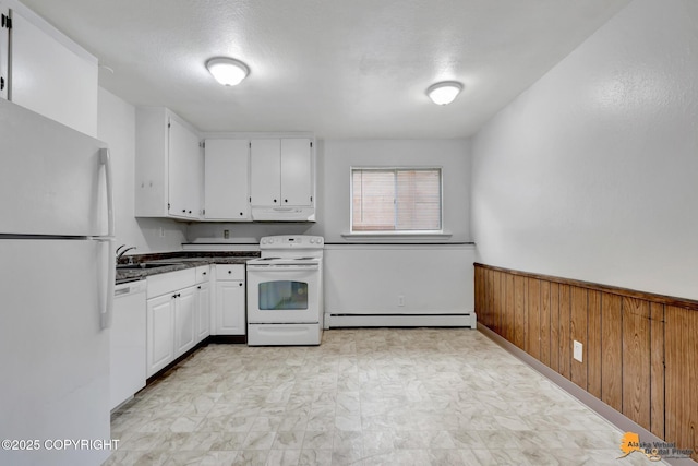525 E 14th Ave, Anchorage, AK 99501 - kitchen featuring white appliances, white cabinets, a baseboard heating unit, and under cabinet range hood