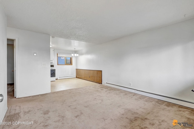 525 E 14th Ave, Anchorage, AK 99501 - unfurnished room with a baseboard heating unit, carpet, a chandelier, and a baseboard radiator