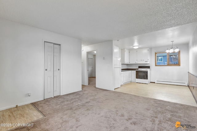 525 E 14th Ave, Anchorage, AK 99501 - unfurnished living room featuring a chandelier, light carpet, and a baseboard heating unit