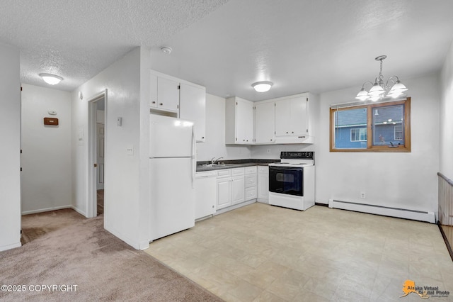 525 E 14th Ave, Anchorage, AK 99501 - kitchen with white appliances, a textured ceiling, a baseboard heating unit, white cabinetry, and a chandelier