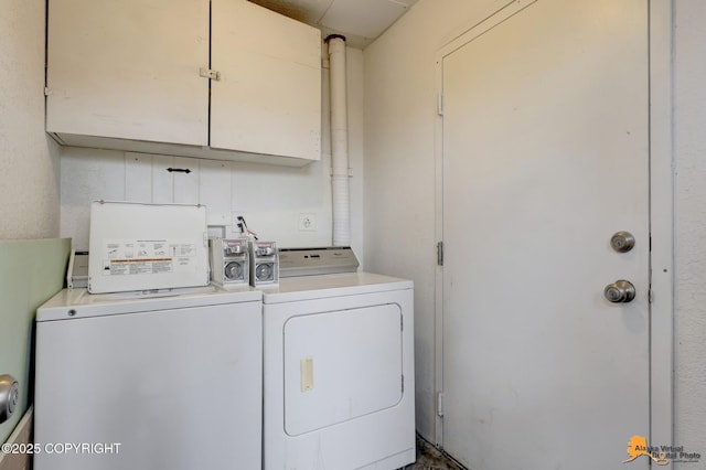 525 E 14th Ave, Anchorage, AK 99501 - laundry room featuring washing machine and dryer and cabinet space