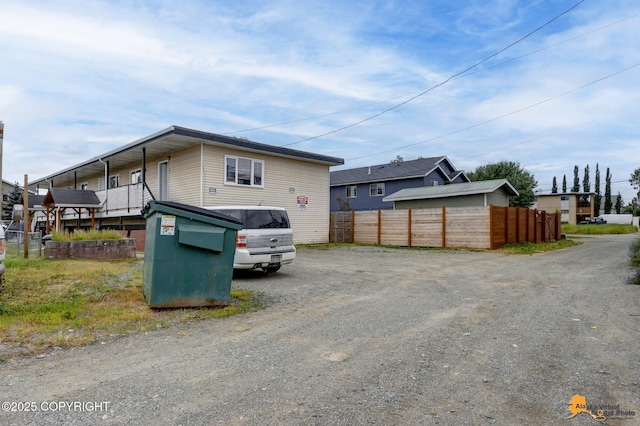 525 E 14th Ave, Anchorage, AK 99501 - view of front facade featuring gravel driveway