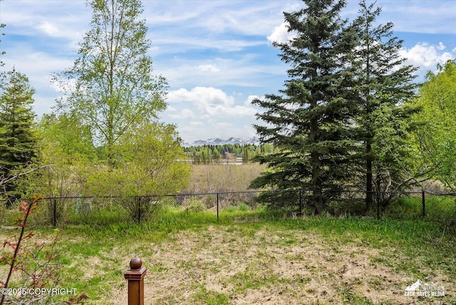 6537 Air Guard Rd, Anchorage, AK 99502 - view of yard with a mountain view