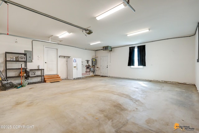 garage featuring white fridge with ice dispenser, electric panel, a garage door opener, and a central vacuum unit