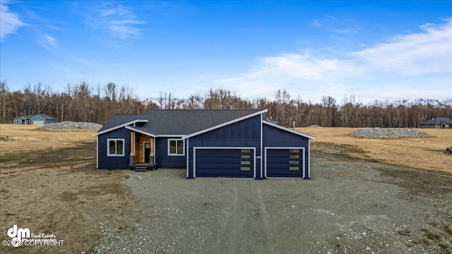 exterior space with dirt driveway