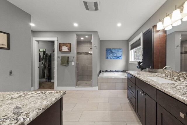 full bath featuring recessed lighting, visible vents, a shower stall, and a garden tub