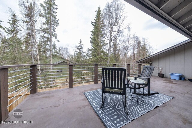 view of patio with a balcony