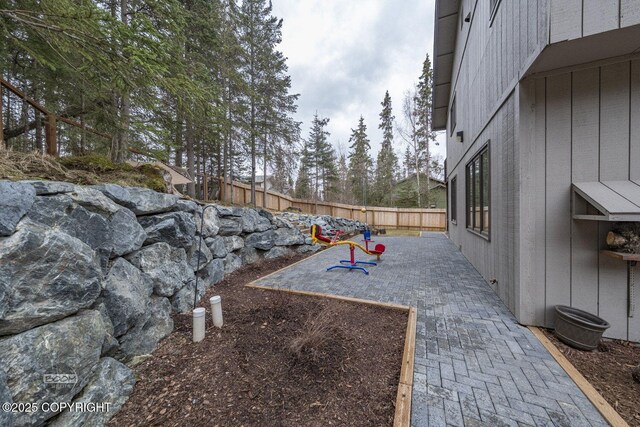 view of yard with a fenced backyard and a patio