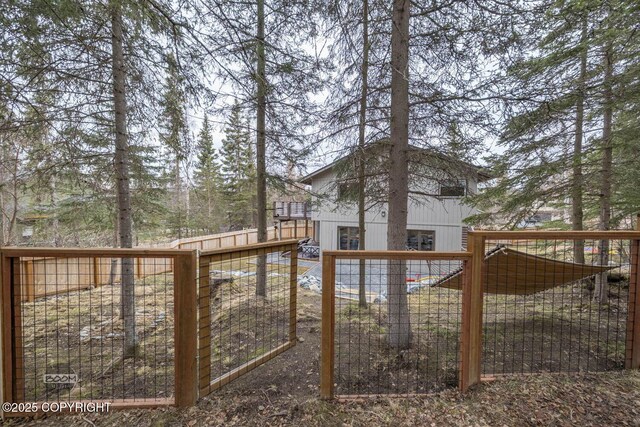 view of yard with a gate
