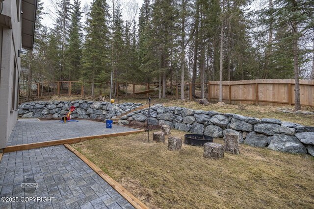 view of yard featuring a patio and a fenced backyard