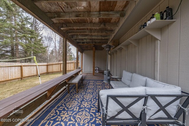 view of patio with a fenced backyard and outdoor lounge area