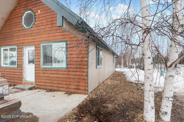 910 Refinery Loop, North Pole, AK 99705 - view of side of property with faux log siding