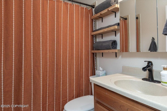 910 Refinery Loop, North Pole, AK 99705 - bathroom featuring toilet and vanity
