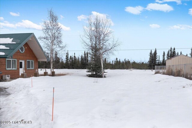 910 Refinery Loop, North Pole, AK 99705 - view of snowy yard
