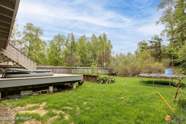 3210 Seawind Dr, Anchorage, AK 99516 - view of yard with a trampoline