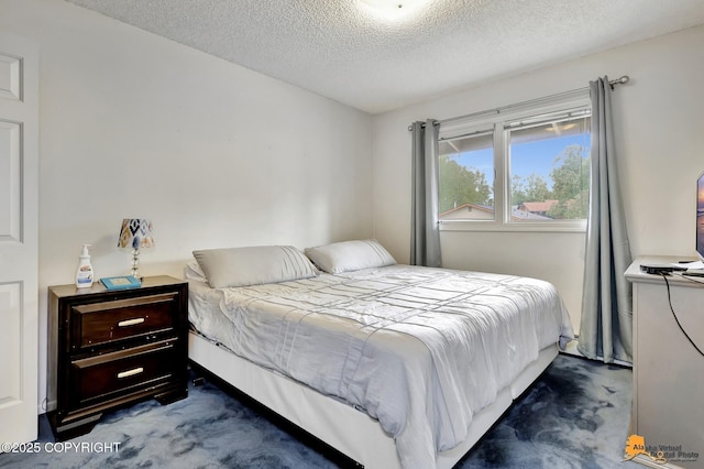3210 Seawind Dr, Anchorage, AK 99516 - bedroom featuring dark carpet and a textured ceiling
