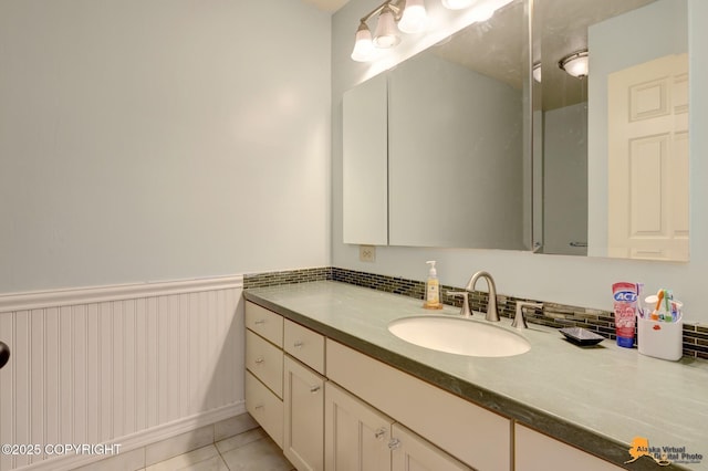 3210 Seawind Dr, Anchorage, AK 99516 - bathroom with vanity, tile patterned flooring, and a wainscoted wall