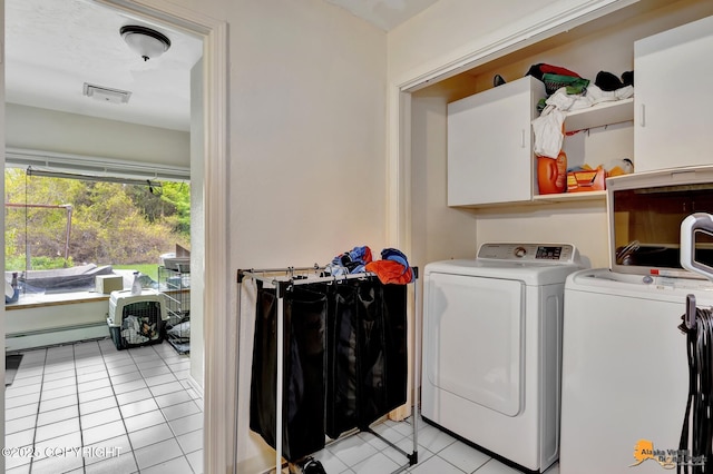 3210 Seawind Dr, Anchorage, AK 99516 - laundry area with separate washer and dryer, a baseboard radiator, and light tile patterned flooring