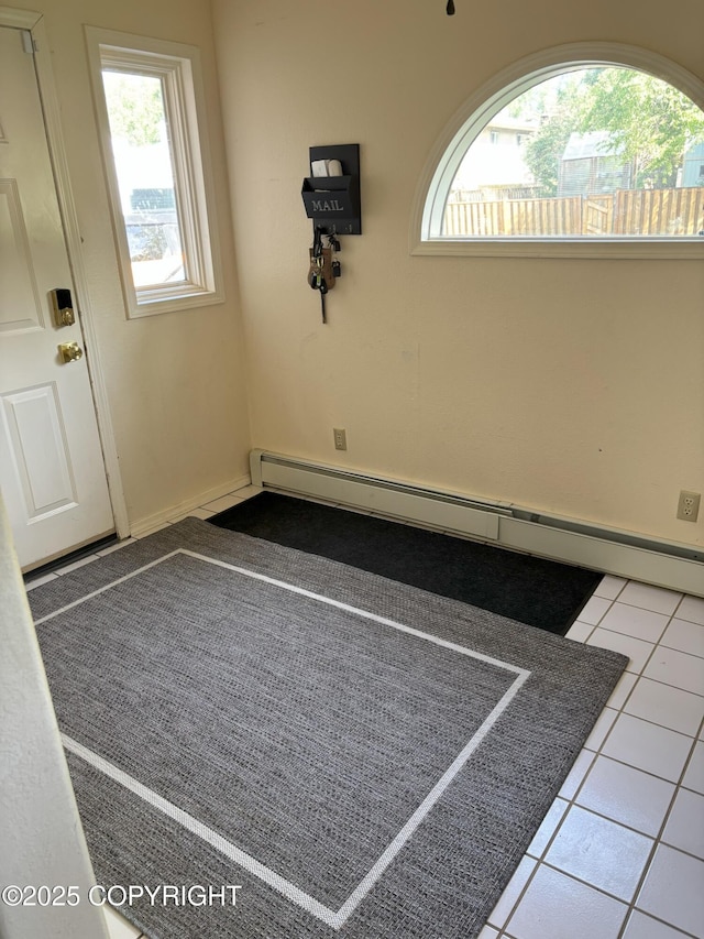 3210 Seawind Dr, Anchorage, AK 99516 - empty room with a baseboard radiator and tile patterned flooring