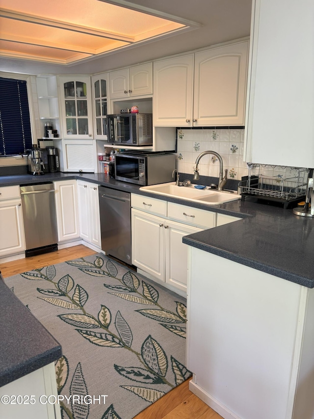 3210 Seawind Dr, Anchorage, AK 99516 - kitchen with appliances with stainless steel finishes, white cabinetry, and a sink