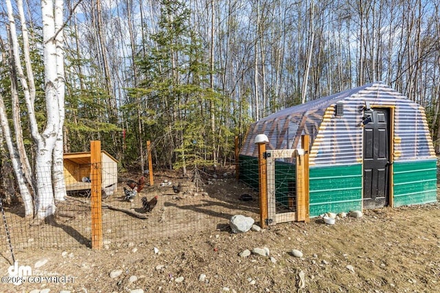3460 S Shamrock St, Wasilla, AK 99623 - view of yard featuring an outbuilding