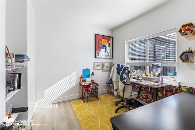 3460 S Shamrock St, Wasilla, AK 99623 - home office featuring wood finished floors and baseboards
