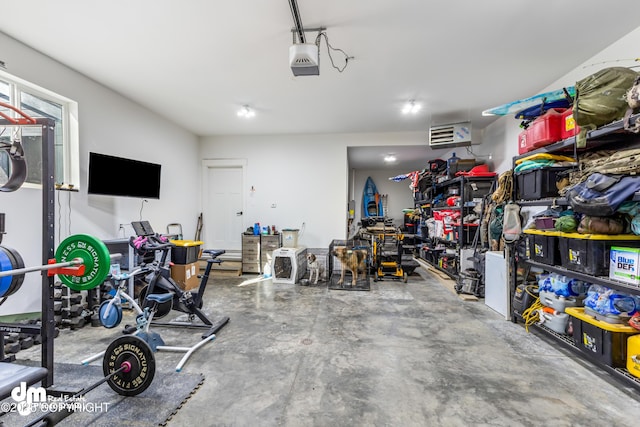 3460 S Shamrock St, Wasilla, AK 99623 - garage featuring a garage door opener