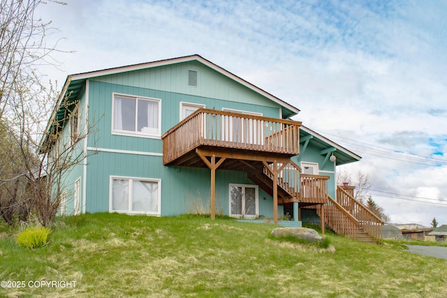 414 Bonanza Ave, Homer, AK 99603 - rear view of property with stairway, a deck, and a yard