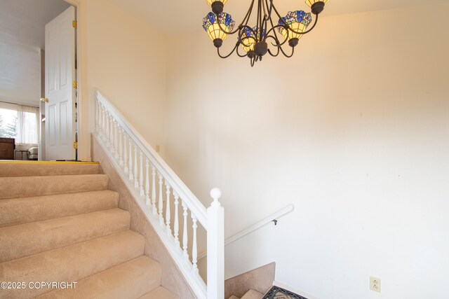 414 Bonanza Ave, Homer, AK 99603 - stairs featuring a chandelier