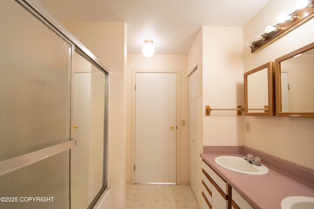 414 Bonanza Ave, Homer, AK 99603 - bathroom with an enclosed shower, double vanity, and tile patterned floors