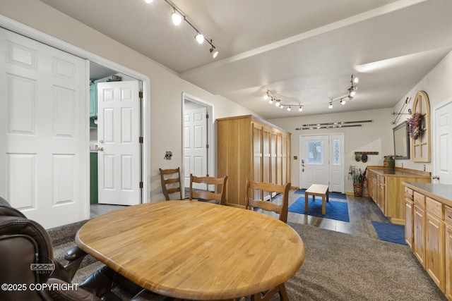 dining area with track lighting