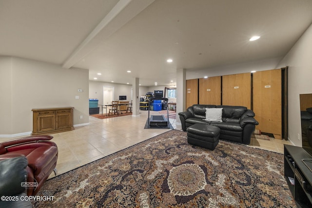 tiled living room featuring recessed lighting, beam ceiling, and baseboards