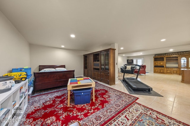 bedroom with recessed lighting and light tile patterned floors
