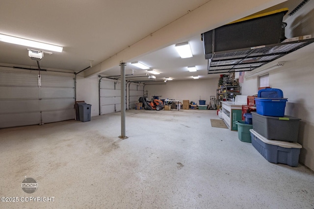 garage featuring a garage door opener