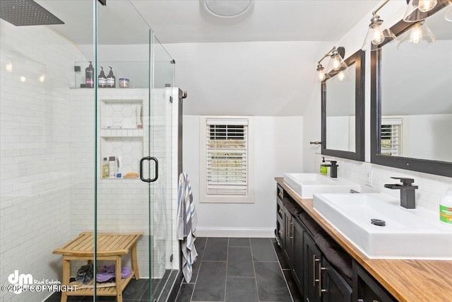 23231 Glacier View Dr, Eagle River, AK 99577 - bathroom with tile patterned flooring, a sink, a shower stall, and double vanity