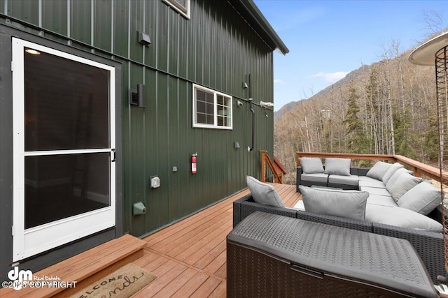 23231 Glacier View Dr, Eagle River, AK 99577 - deck featuring an outdoor hangout area and a mountain view