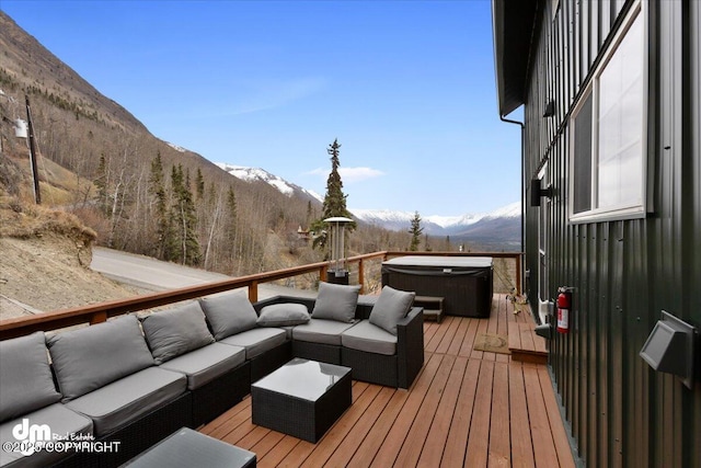 23231 Glacier View Dr, Eagle River, AK 99577 - deck featuring an outdoor living space, a mountain view, and a hot tub