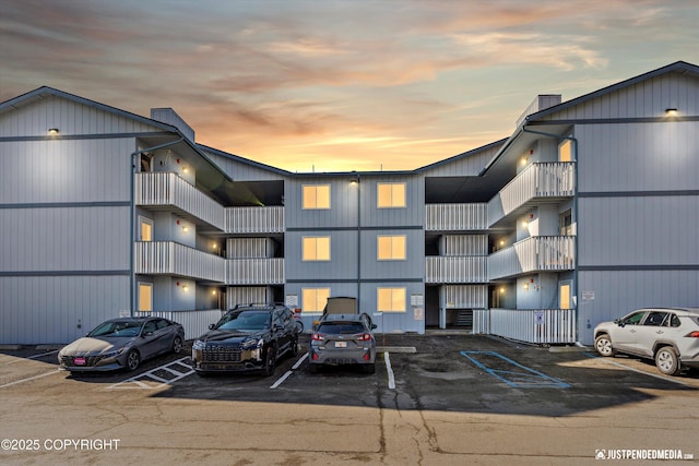 4530 Wright St # 15, Anchorage, AK 99507 - view of building exterior featuring uncovered parking