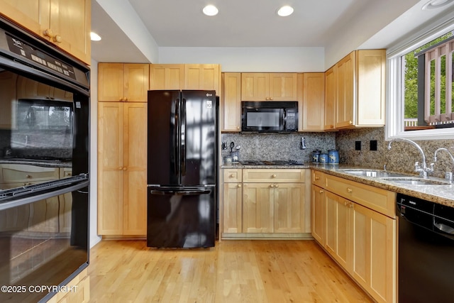 13120 Saunders Rd, Anchorage, AK 99516 - kitchen featuring black appliances, light brown cabinetry, and recessed lighting